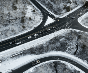 aerial shot of roads surrounded by snow demonstrating winter road hazards