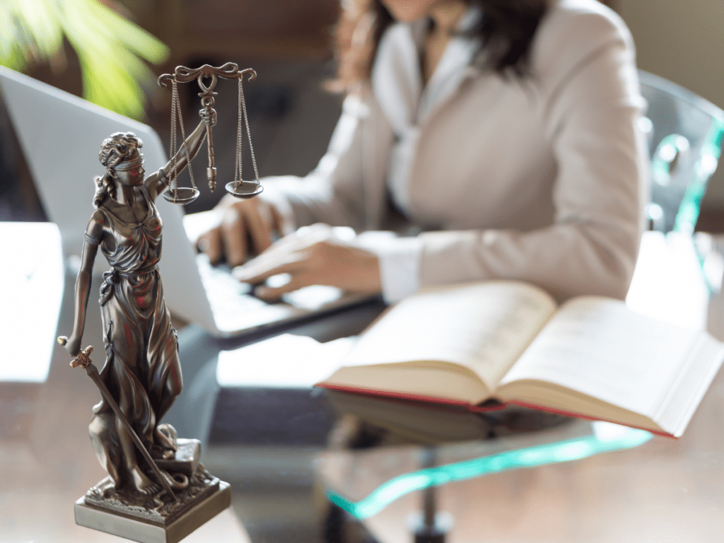 personal injury attorney sits behind desk replying to email with the subject line "do I need a personal injury lawyer?"