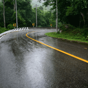 wet road contributes to car wreck and bad weather