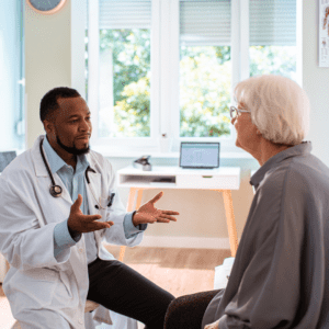 Doctor consults with patient about what procedures their health insurance will cover.