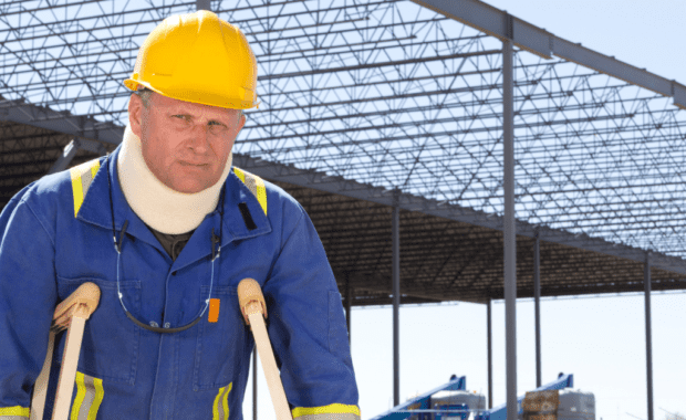 An injured construction worker considers hiring a construction accident injury attorney