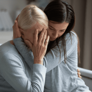 Grandaughter consoles grandmother after emotional elder abuse in her nursing home is revealed.